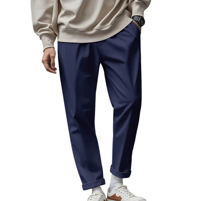 Casual loose men's trousers in navy, featuring a stylish and comfortable design with a mid-waist and drawstring closure.
